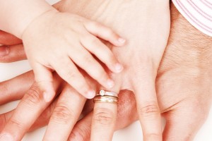 child-parents-hands